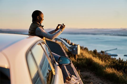 Payless renter taking a picture